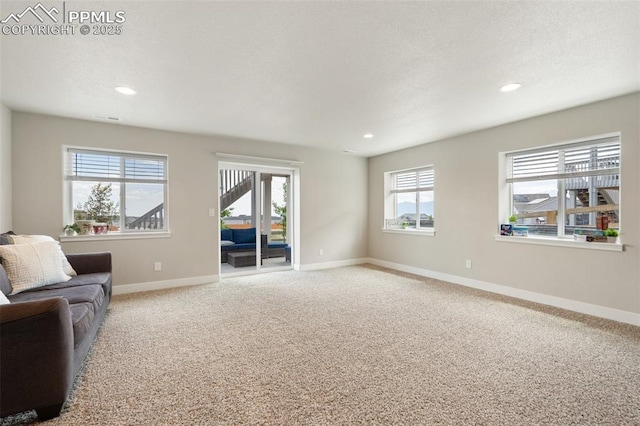 10238 Odin Dr, Colorado Springs, CO 80924 - carpeted living room featuring recessed lighting