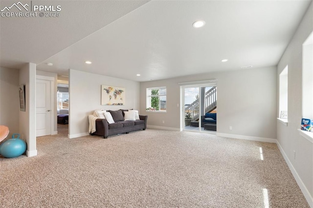 10238 Odin Dr, Colorado Springs, CO 80924 - living area featuring carpet, recessed lighting, and stairway