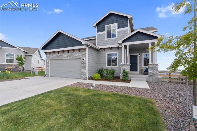 10238 Odin Dr, Colorado Springs, CO 80924 - craftsman inspired home featuring concrete driveway, a garage, a front lawn, and stone siding