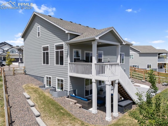10238 Odin Dr, Colorado Springs, CO 80924 - back of property with roof with shingles, stairs, a deck, and a patio area