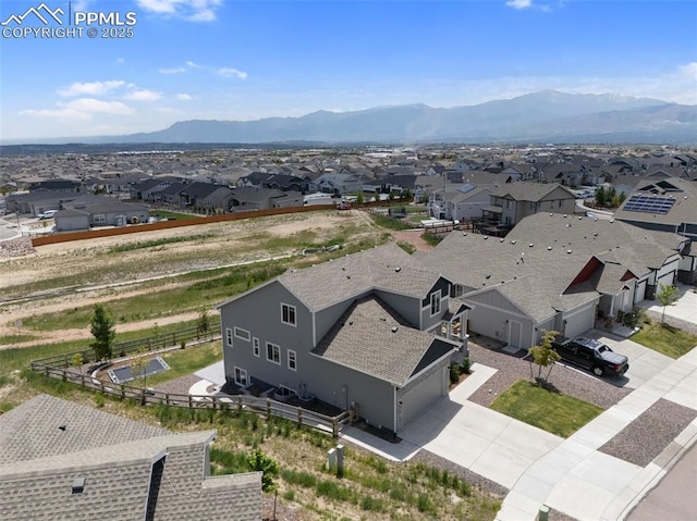 10238 Odin Dr, Colorado Springs, CO 80924 - aerial perspective of suburban area featuring a mountain backdrop