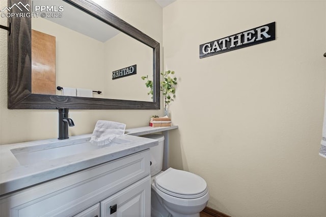 2505 Wimbleton Ct, Colorado Springs, CO 80920 - half bathroom with vanity and toilet