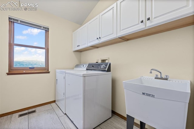 2505 Wimbleton Ct, Colorado Springs, CO 80920 - laundry area with washer and clothes dryer and cabinet space