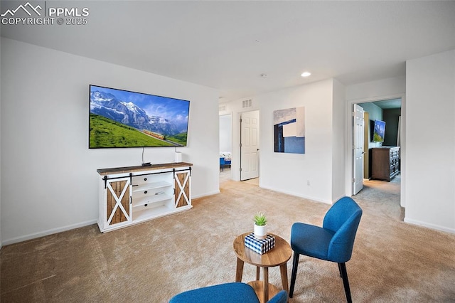 4867 Wolf Moon Dr, Colorado Springs, CO 80911 - sitting room featuring carpet floors and recessed lighting