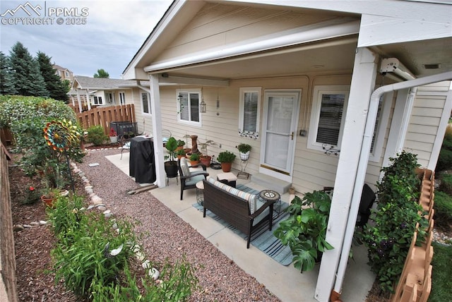 4201 Stonesthrow Vw, Colorado Springs, CO 80922 - property entrance with an outdoor hangout area and a patio area
