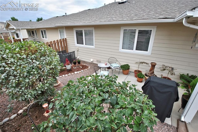 4201 Stonesthrow Vw, Colorado Springs, CO 80922 - exterior space featuring roof with shingles and a patio area