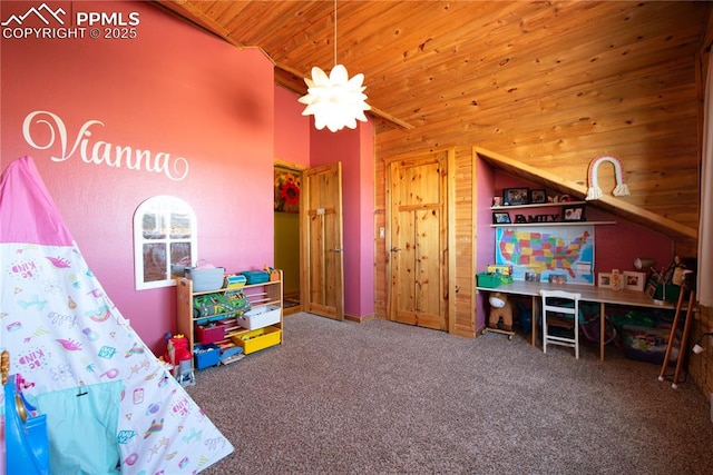 1160 Diamond Back Trl, Canon City, CO 81212 - playroom featuring wooden ceiling, carpet, vaulted ceiling, and wood walls