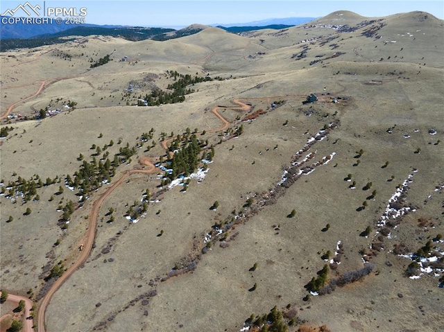 1160 Diamond Back Trl, Canon City, CO 81212 - aerial overview of property's location featuring a mountain backdrop and a desert landscape