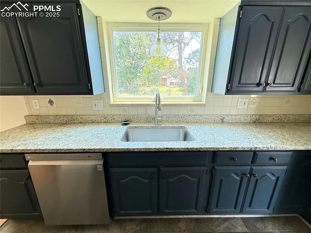 251 Fay Dr, Colorado Springs, CO 80911 - kitchen featuring stainless steel dishwasher, backsplash, and hanging light fixtures