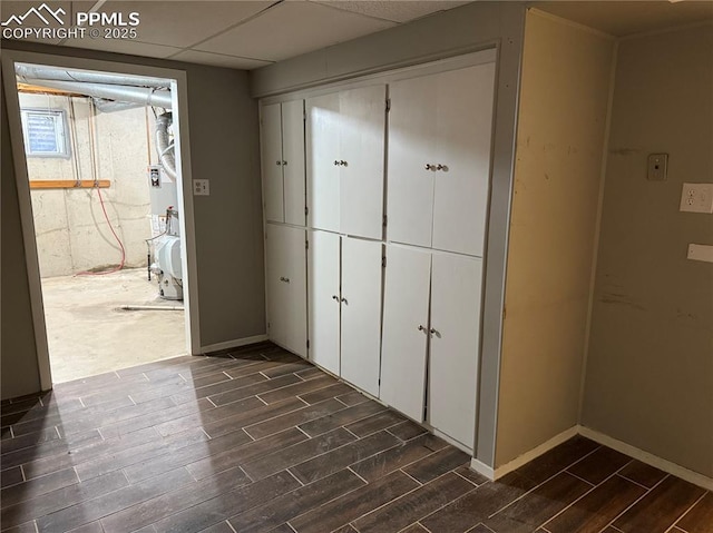 251 Fay Dr, Colorado Springs, CO 80911 - hall with wood finish floors and water heater