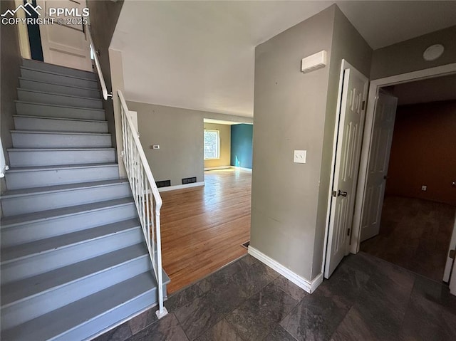 251 Fay Dr, Colorado Springs, CO 80911 - stairway featuring baseboards