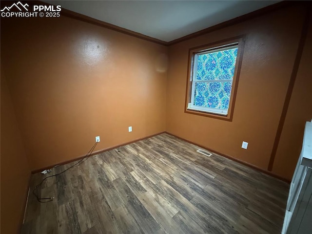 251 Fay Dr, Colorado Springs, CO 80911 - unfurnished room featuring wood finished floors and crown molding