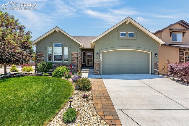 2997 Bright Moon Dr, Colorado Springs, CO 80908 - view of front of home with stucco siding, stone siding, driveway, an attached garage, and a front lawn