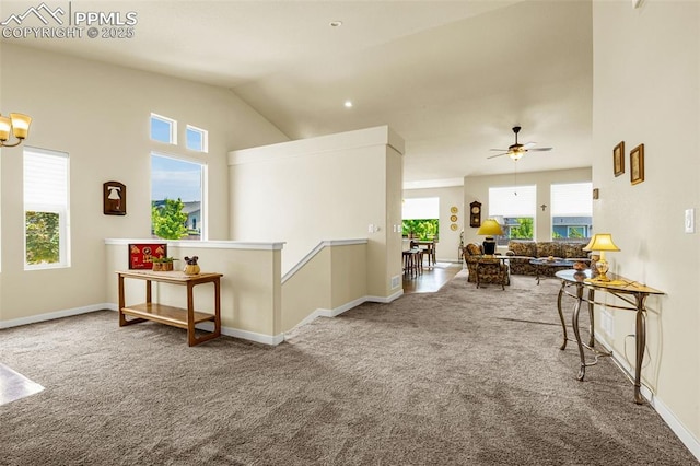 2997 Bright Moon Dr, Colorado Springs, CO 80908 - corridor with carpet floors, plenty of natural light, and lofted ceiling