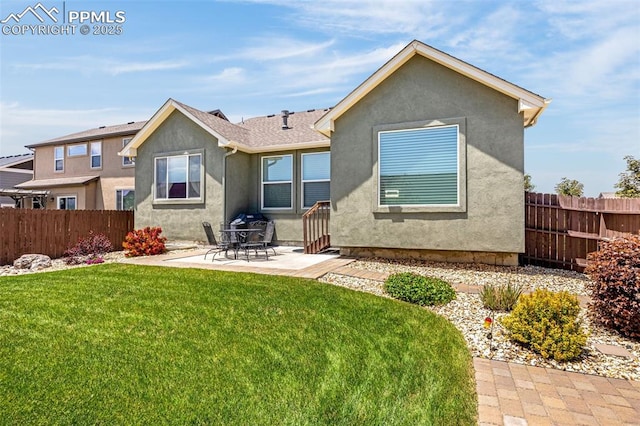 2997 Bright Moon Dr, Colorado Springs, CO 80908 - back of house featuring a patio area and stucco siding