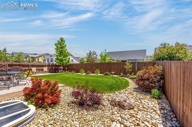 2997 Bright Moon Dr, Colorado Springs, CO 80908 - fenced backyard with a residential view and a patio area