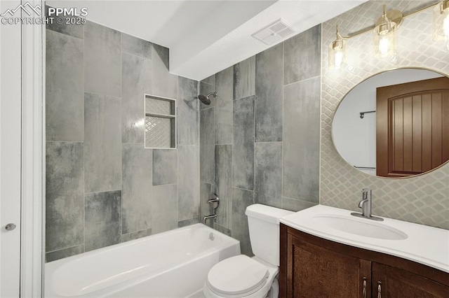 35 Lowick Dr, Colorado Springs, CO 80906 - bathroom with tile walls, tub / shower combination, and vanity