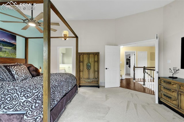 35 Lowick Dr, Colorado Springs, CO 80906 - carpeted bedroom featuring connected bathroom and a towering ceiling