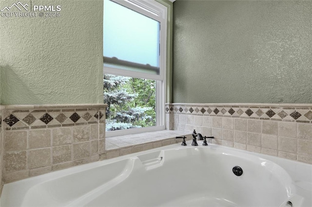 35 Lowick Dr, Colorado Springs, CO 80906 - bathroom with a textured wall and a whirlpool tub
