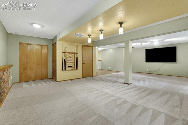 35 Lowick Dr, Colorado Springs, CO 80906 - finished below grade area with light colored carpet and a textured ceiling
