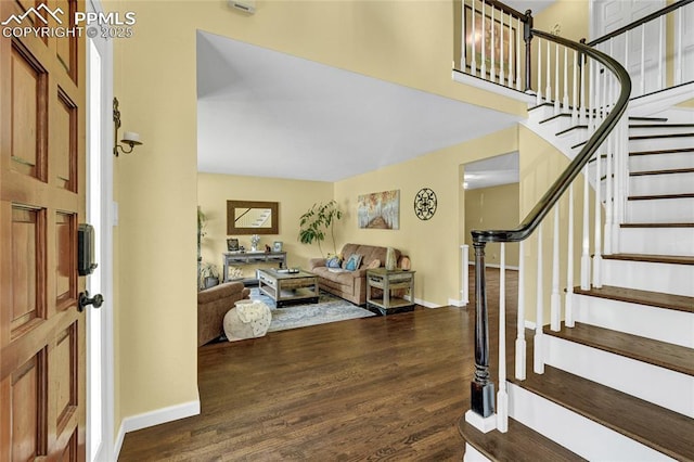35 Lowick Dr, Colorado Springs, CO 80906 - entrance foyer with wood finished floors and stairway