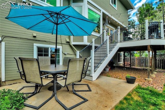 35 Lowick Dr, Colorado Springs, CO 80906 - view of patio / terrace with outdoor dining area, stairs, and a wooden deck