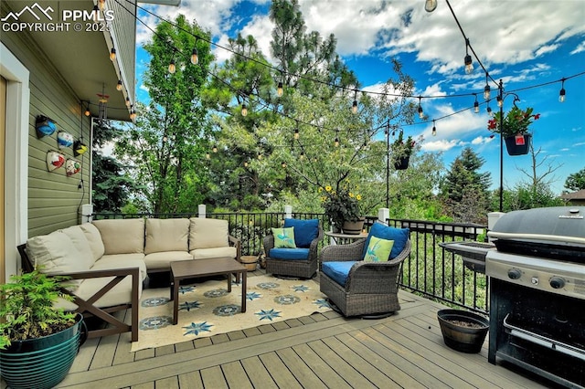 35 Lowick Dr, Colorado Springs, CO 80906 - wooden terrace featuring an outdoor living space and grilling area