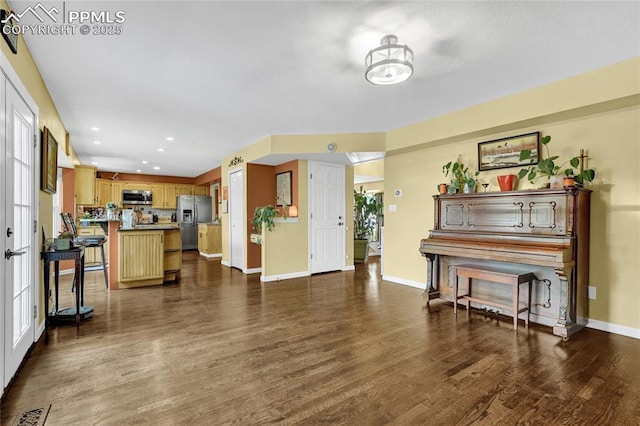 35 Lowick Dr, Colorado Springs, CO 80906 - living room featuring dark wood-type flooring and recessed lighting