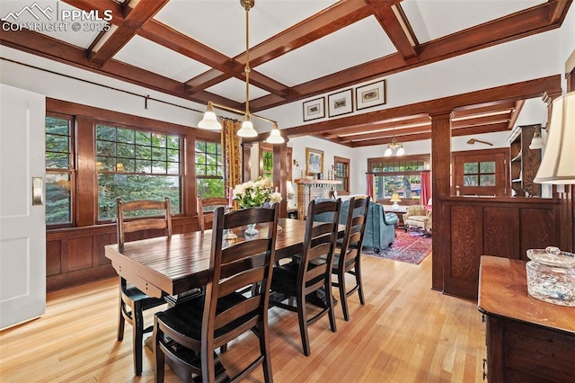 13 2nd St, Colorado Springs, CO 80906 - dining area with coffered ceiling, light wood-style flooring, ornate columns, healthy amount of natural light, and beamed ceiling