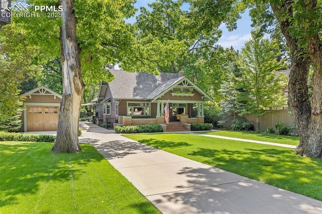 13 2nd St, Colorado Springs, CO 80906 - view of front of house with a porch and a chimney