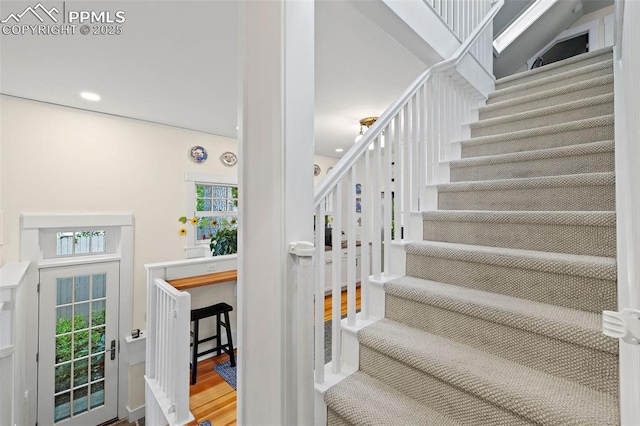13 2nd St, Colorado Springs, CO 80906 - stairway with wood finished floors and recessed lighting