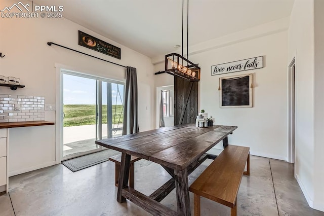 6925 Ht Ranch Trl, Colorado Springs, CO 80908 - dining space with concrete floors and baseboards