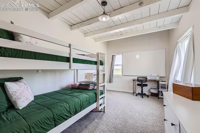 6925 Ht Ranch Trl, Colorado Springs, CO 80908 - carpeted bedroom featuring a wood ceiling with exposed beams and a desk