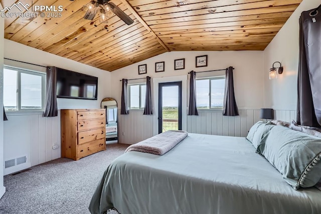 6925 Ht Ranch Trl, Colorado Springs, CO 80908 - carpeted bedroom with access to exterior, vaulted ceiling, wainscoting, and wood ceiling