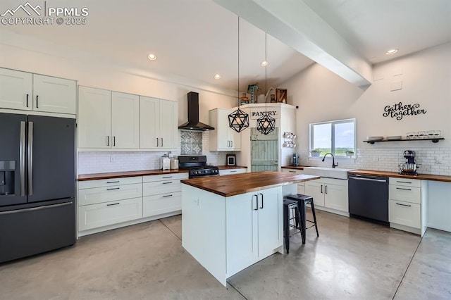 6925 Ht Ranch Trl, Colorado Springs, CO 80908 - kitchen featuring wood counters, stainless steel refrigerator with ice dispenser, dishwashing machine, wall chimney exhaust hood, and black range with gas cooktop