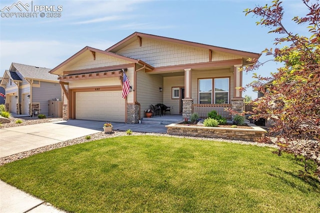4187 Notch Trl, Colorado Springs, CO 80924 - craftsman inspired home featuring stone siding, a front yard, an attached garage, driveway, and a porch