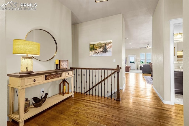 4187 Notch Trl, Colorado Springs, CO 80924 - hall with an upstairs landing and wood finished floors