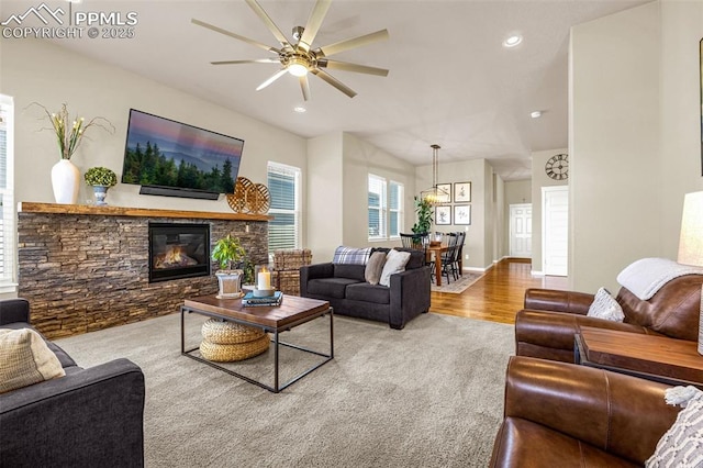 4187 Notch Trl, Colorado Springs, CO 80924 - living area featuring ceiling fan, a fireplace, wood finished floors, and recessed lighting