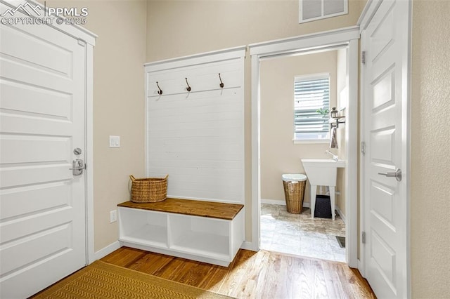 4187 Notch Trl, Colorado Springs, CO 80924 - mudroom with wood finished floors and baseboards