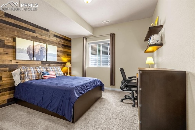 4187 Notch Trl, Colorado Springs, CO 80924 - bedroom featuring wooden walls, carpet floors, and an office area