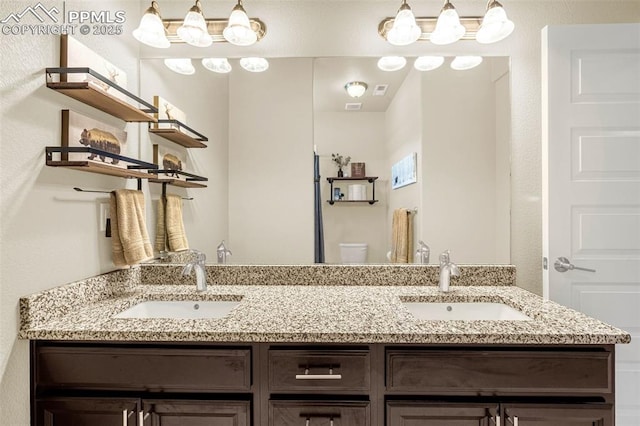 4187 Notch Trl, Colorado Springs, CO 80924 - full bathroom with double vanity and toilet