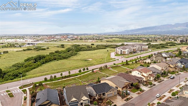 4187 Notch Trl, Colorado Springs, CO 80924 - aerial perspective of suburban area with mountains