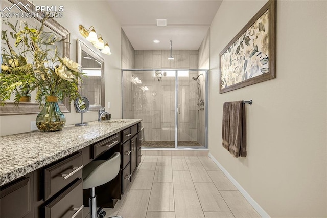 4187 Notch Trl, Colorado Springs, CO 80924 - bathroom featuring vanity and a shower stall