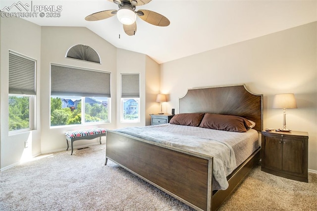7544 Lake Ave, Fountain, CO 80817 - bedroom featuring light colored carpet, vaulted ceiling, and a ceiling fan