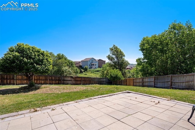 7544 Lake Ave, Fountain, CO 80817 - fenced backyard with a patio