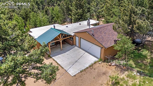 269 Evergreen Rd, Woodland Park, CO 80863 - aerial view of property and surrounding area with a heavily wooded area