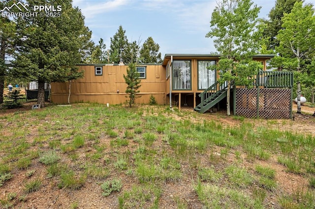 269 Evergreen Rd, Woodland Park, CO 80863 - view of yard with stairway and a deck