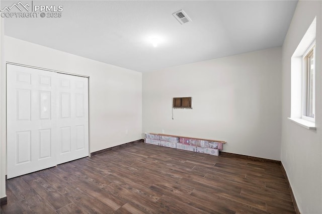 2027 E 14th St, Pueblo, CO 81001 - unfurnished bedroom with wood finished floors and baseboards