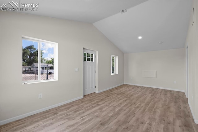 2027 E 14th St, Pueblo, CO 81001 - empty room with vaulted ceiling, light wood finished floors, and recessed lighting