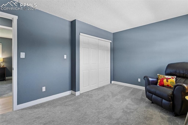 4603 Bella Dr, Colorado Springs, CO 80918 - sitting room with carpet floors and a textured ceiling